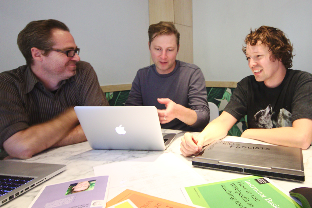 Sage Ross (on the right) working with developers from WINTR out of their office in Seattle.