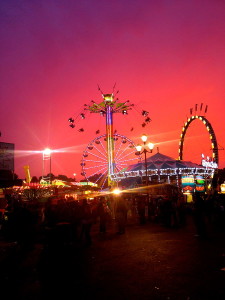 "NC State Fair Sunset" by Melizabethi123 - Own work. Licensed under CC BY-SA 3.0 via Wikimedia Commons.