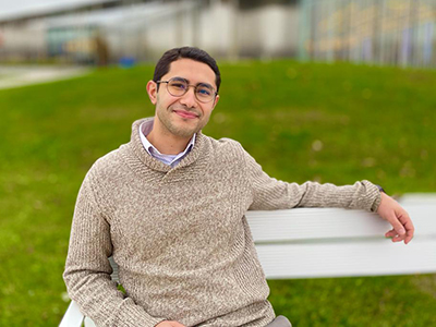 Joseph Wahba sitting on bench